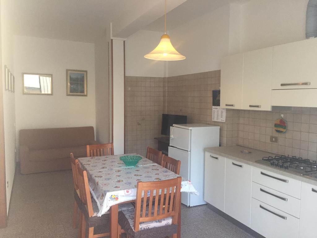 อัปปาร์ตาเมนติ อะ ดูเอ ปาสซิ ดาล มาเร Apartment ลิโดดิเยโซโล ห้อง รูปภาพ